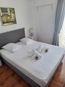 Postel nebo postele na pokoji v ubytování Agali bay hotel
