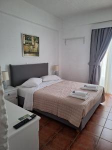 Postel nebo postele na pokoji v ubytování Agali bay hotel