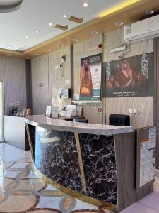 أعمال الهاشم للشقق المخدومة ضبا Al Hashem for Served Apartments的厨房或小厨房