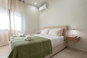 En eller flere senge i et værelse på Brisa Marina Limnos