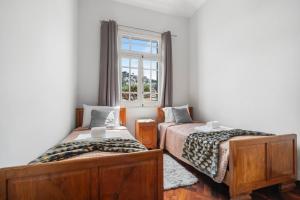 Ένα ή περισσότερα κρεβάτια σε δωμάτιο στο Akosuah's Villa