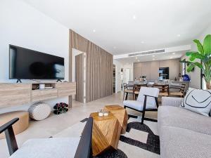 a living room with a couch and a tv at Villa Verano San Javier - 6610 in San Javier