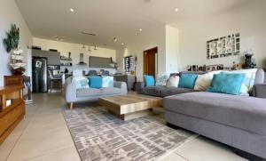 Χώρος καθιστικού στο La Mivoie Beachfront Tamarin