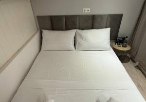 En eller flere senge i et værelse på Villa Adria + 15 billeder