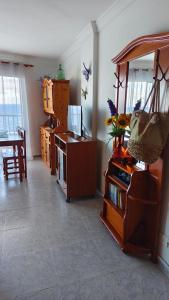 TV a/nebo společenská místnost v ubytování Acogedor Apartamento en Playa San Marcos, Icod de los Vinos