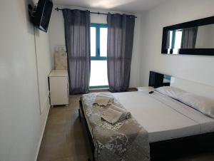Postel nebo postele na pokoji v ubytování Atrium Appartement