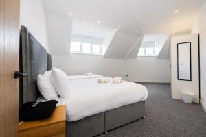 Ένα ή περισσότερα κρεβάτια σε δωμάτιο στο Stanway Apartments- Free Parking