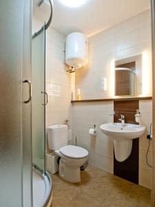 Kúpeľňa v ubytovaní Apartamenty studio Metropolio Centrum