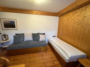 Katil atau katil-katil dalam bilik di Apartment Cortina d'Ampezzo -City center-