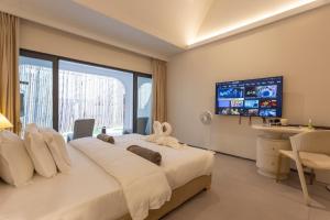 Televiisor ja/või meelelahutuskeskus majutusasutuses YUSU Hotel 羽宿酒店