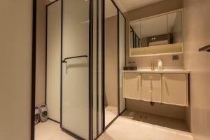 Vannituba majutusasutuses YUSU Hotel 羽宿酒店