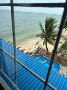a view of the beach from the balcony of a resort at Becca's Vacation House 