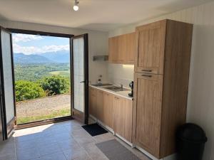 Kuchyň nebo kuchyňský kout v ubytování L'Horizon I T2