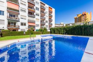 Bazén v ubytování Sol Montemar 10 by IVI Real Estate nebo v jeho okolí