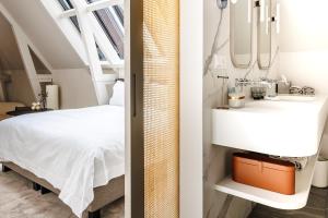Pillows Grand Boutique Hotel Maurits at the Park - Small Luxury Hotels客房内的一张或多张床位