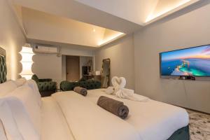 Televiisor ja/või meelelahutuskeskus majutusasutuses YUSU Hotel 羽宿酒店
