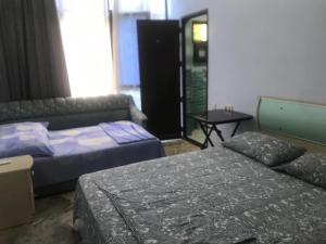 Letto o letti in una camera di THEODORE-Hotel