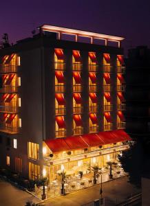 a large building with redazes on the side of it at Hotel HamilTown in Cattolica