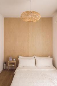 Postel nebo postele na pokoji v ubytování 오조록 제주