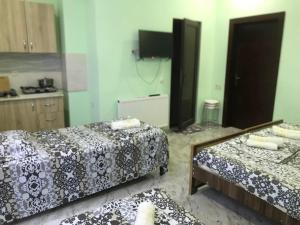 Letto o letti in una camera di THEODORE-Hotel