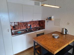 A kitchen or kitchenette at Charming apartment with great view