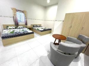 Postel nebo postele na pokoji v ubytování HALA Hotel