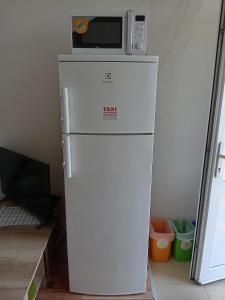 A kitchen or kitchenette at Apartmany Fantagiro