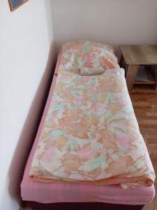 A bed or beds in a room at Apartmany Fantagiro