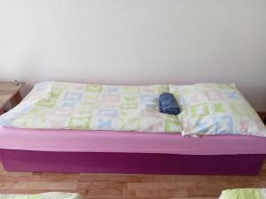 A bed or beds in a room at Apartmany Fantagiro