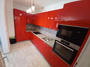 Kuchyň nebo kuchyňský kout v ubytování Vile Park Apartments