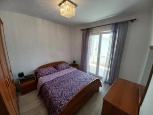 Postel nebo postele na pokoji v ubytování Vile Park Apartments