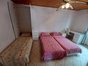 Postel nebo postele na pokoji v ubytování Vile Park Apartments