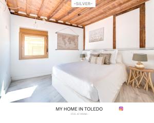 Postel nebo postele na pokoji v ubytování -SILVER- by myhomeintoledo