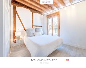 Postel nebo postele na pokoji v ubytování -SILVER- by myhomeintoledo