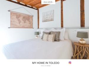 Postel nebo postele na pokoji v ubytování -SILVER- by myhomeintoledo