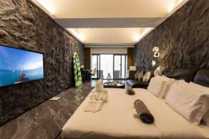 Voodi või voodid majutusasutuse YUSU Hotel 羽宿酒店 toas +37 fotot