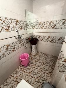 Ванная комната в Krishnam Homestay