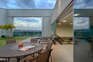 Uma varanda ou terraço em Intercity BH Expo