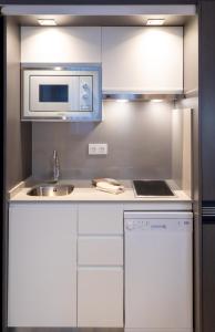 Η κουζίνα ή μικρή κουζίνα στο Bilbao City Center by abba Suites +31 φωτογραφίες