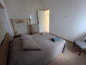 En eller flere senge i et værelse på Entre cuves et sources - au coeur de Goudargues