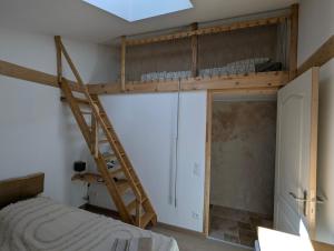 En eller flere senge i et værelse på Entre cuves et sources - au coeur de Goudargues