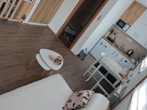 Kuchyň nebo kuchyňský kout v ubytování Studio apartman "Kutak DIVUS"