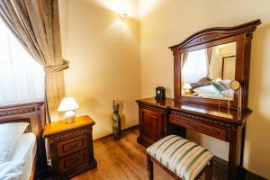 Postel nebo postele na pokoji v ubytování Knížecí apartmány Regent