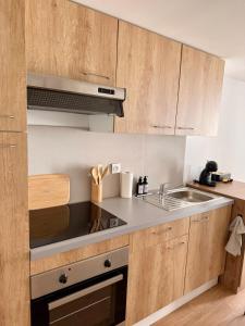 Η κουζίνα ή μικρή κουζίνα στο Appartement +2 φωτογραφίες