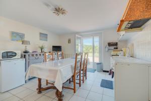 Η κουζίνα ή μικρή κουζίνα στο Charmant Appartement De Plein Pied