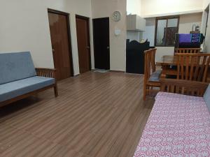 a living room with a couch and a table at Gail Villa Igatpuri in Igatpuri