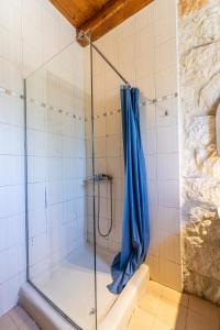 A bathroom at Platanus Inn Apartments by "elite"