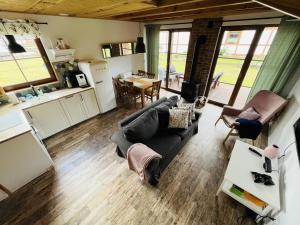 Η κουζίνα ή μικρή κουζίνα στο Domek na Kaszubach 15-2 - Ostoja Bukowo +3 φωτογραφίες