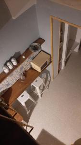 an overhead view of a table with a laptop on it at B&b Miele&mare in Melendugno +11 photos