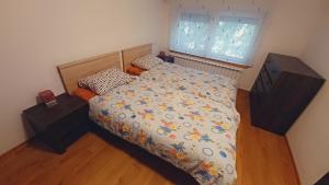 a bedroom with a bed and a window at Vile Park Apartments Pula in Pula
